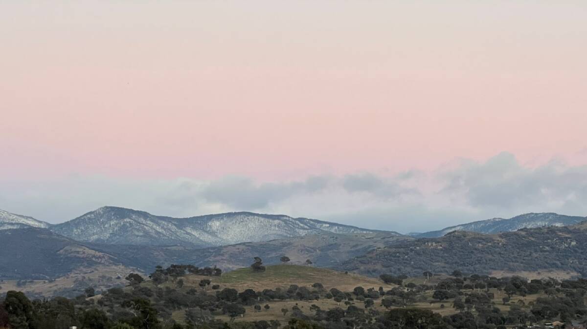 View of snowy mountains from Tuggeranong on Wednesday morning. Picture: Sachin Tyagi