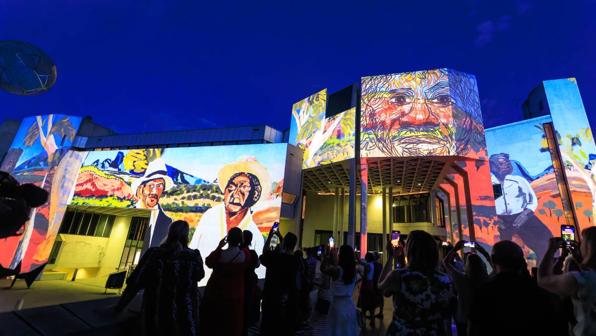 Vincent Namatjira's Indigenous All Stars projected onto the National Gallery of Australia. Picture by Sitthixay Ditthavong