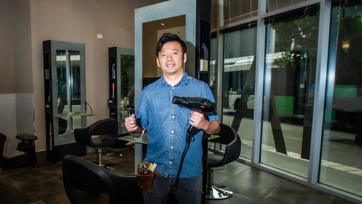 O2 Hair co-owner Kelvin Fong operates his salon near the ANU Acton campus. Picture: Karleen Minney