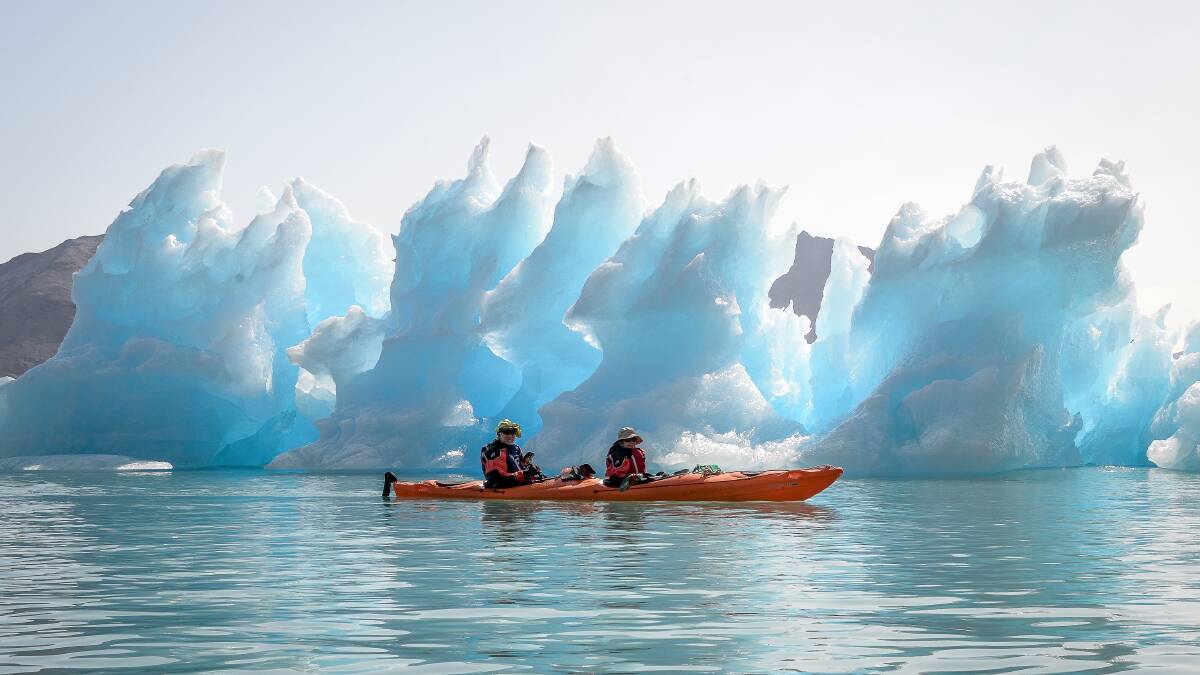 Anne Holmes and Roy Harvey kayaking during an Antartica trip in 2019. Picture supplied