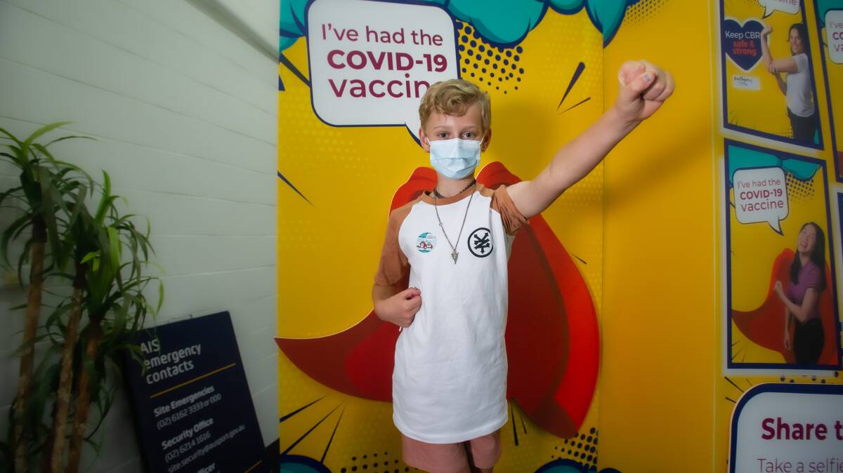 Ten-year-old June Tattam had her first dose at the AIS mass vaccination clinic. Picture: Karleen Minney