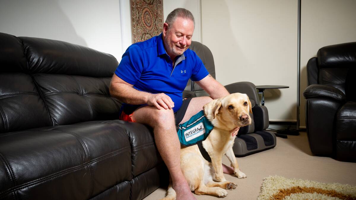 Veteran Chris Hodder pictured with his service dog Bella. Picture: Elesa Kurtz