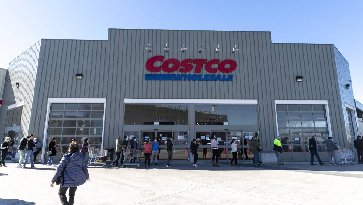 People line up outside Costco on Thursday. Picture: Keegan Carroll