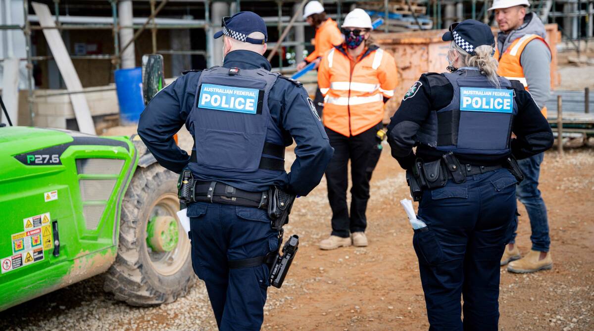 Police conduct a compliance check at a construction site. Picture: Supplied