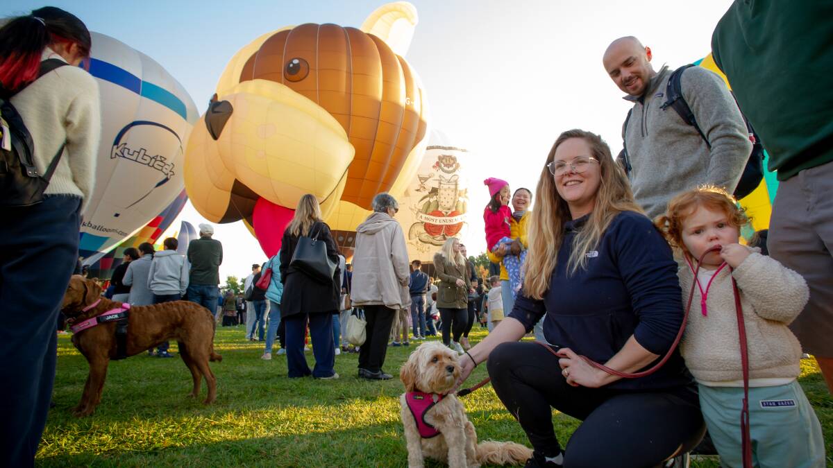 Flossie with Alison Jones, Ellie Miller-Jones, 2, and Austin Miller of Hughes with Buster at Patrick White Lawns. Picture by Elesa Kurtz