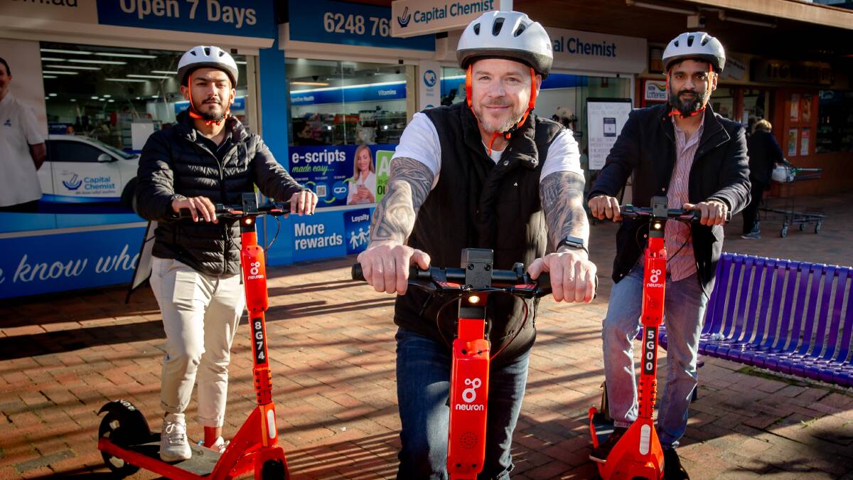 Jimi O'Connor from Downer said he would take advantage of the free e-scooter offer Pictured with operations managers Sahaj Chopra and Yas Naseen. Picture: Elesa Kurtz