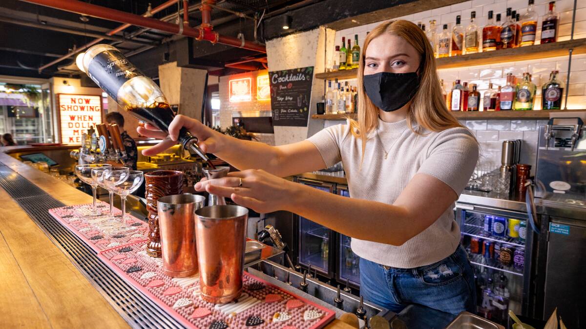 Dolly bartender Jessica Tonkin said customers might feel safer with the mask mandate. Picture: Sitthixay Ditthavong