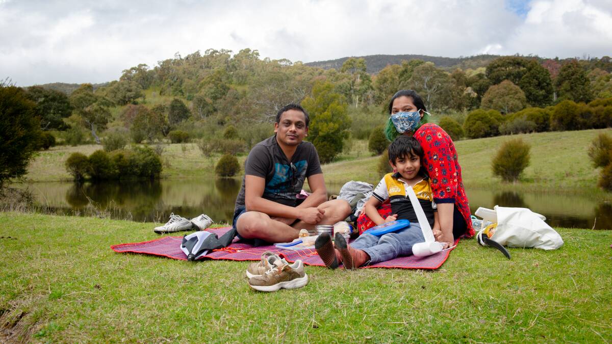 Nantha and Sneha Kumar picnic with their son Ishan at Tidbinbilla. Picture: Elesa Kurtz
