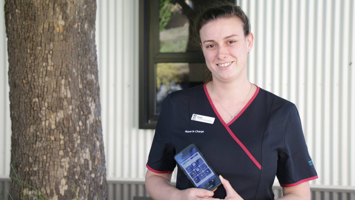 Canberra Hospital clinical nurse consultant Kate Gorel with a digital health records mobile device. Picture by Liam Hodges