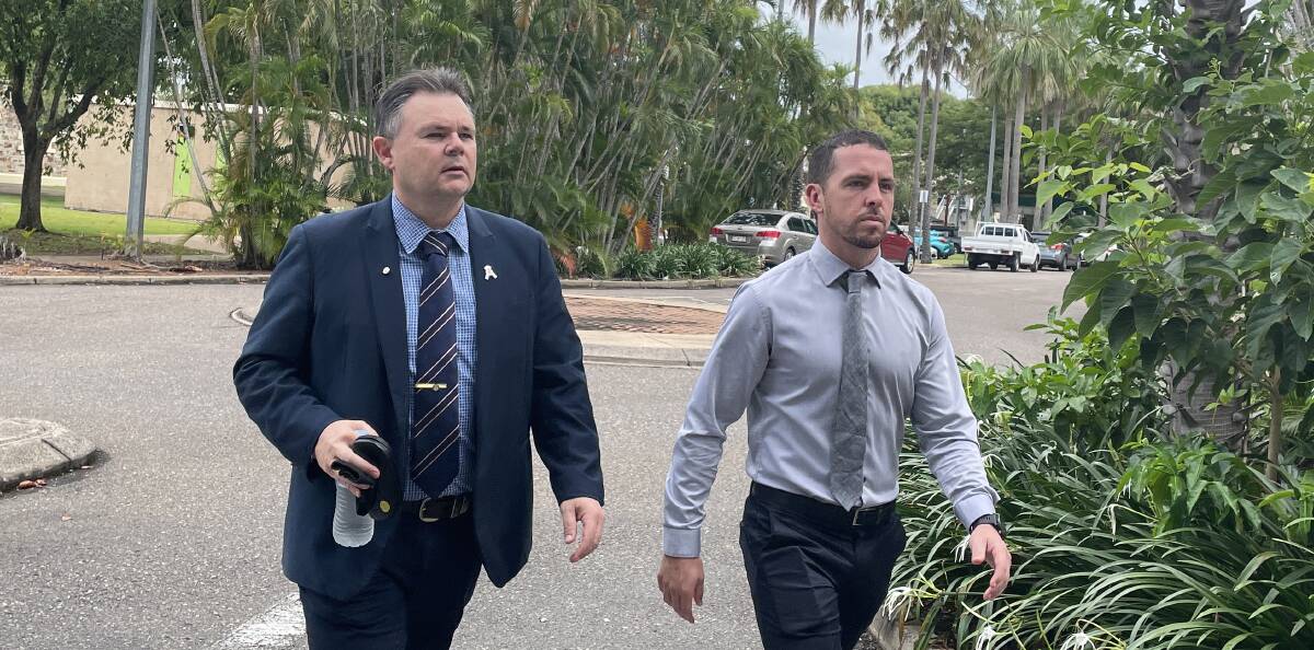 WEEK THREE: Constable Rolfe, right, arrives at court with NT Police Association President Paul McCue. Picture: Sarah Matthews
