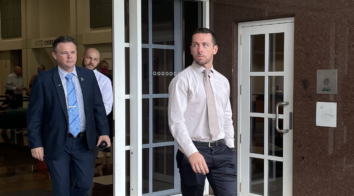 Zachary Rolfe (right) leaves the Darwin Supreme Court. Picture: Sarah Matthews