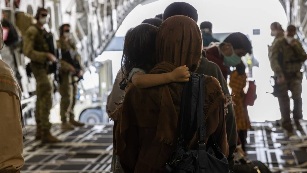Afghanistan evacuees arrive at Australia's main operating base in the Middle East, on board a Royal Australian Air Force C-17A Globemaster. Picture: ADF