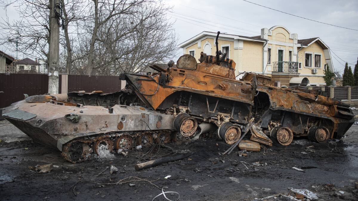 Abandoned tanks in the Ukrainian town of Bucha, site of apparent war crimes. Picture: Getty Images