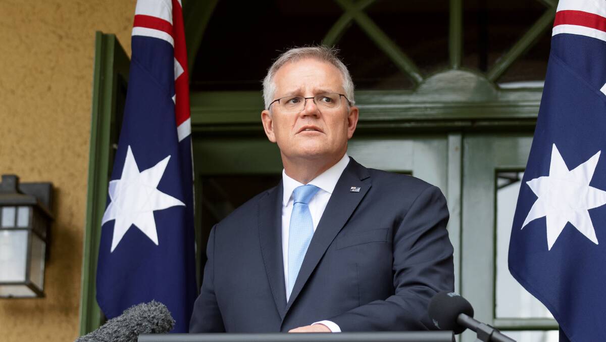 Prime Minister Scott Morrison unveiling plans to reopen the international border. Picture: Sitthixay Ditthavong