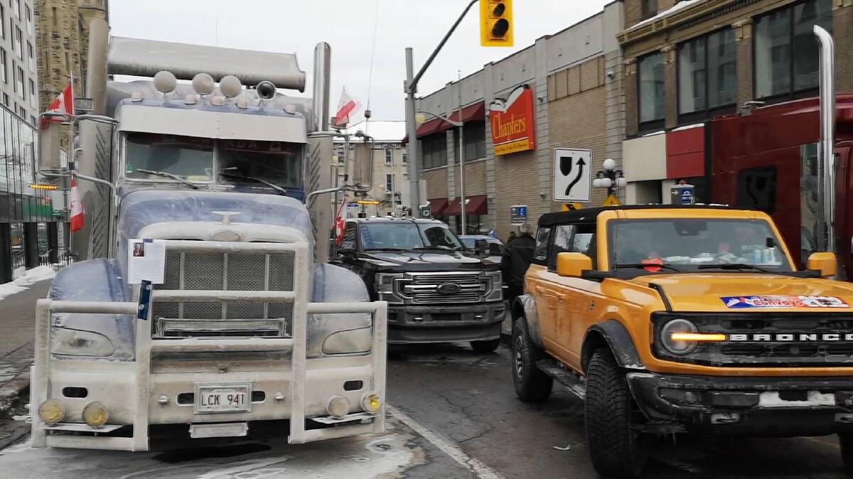 Trucks block a street in Ottawa on Monday, January 31 in protest of a mandate requiring unvaccinated truck drivers to quarantine after returning from the US. 