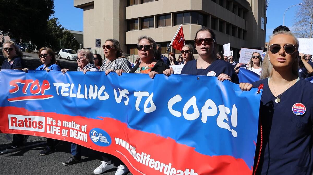Nurses and midwives march down Darby Street in Newcaslte, NSW on Thursday, September 1, 2022. Photo: Shive Prema. 