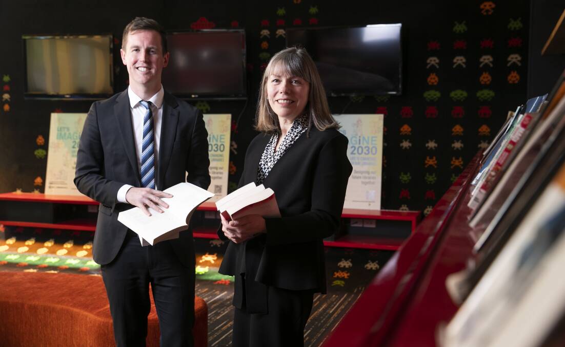 Minister for Transport and City Services Chris Steel and Australian Library and Information Association chief executive Sue McKerracher are pushing for a change in ACT libraries. Picture: Keegan Carroll