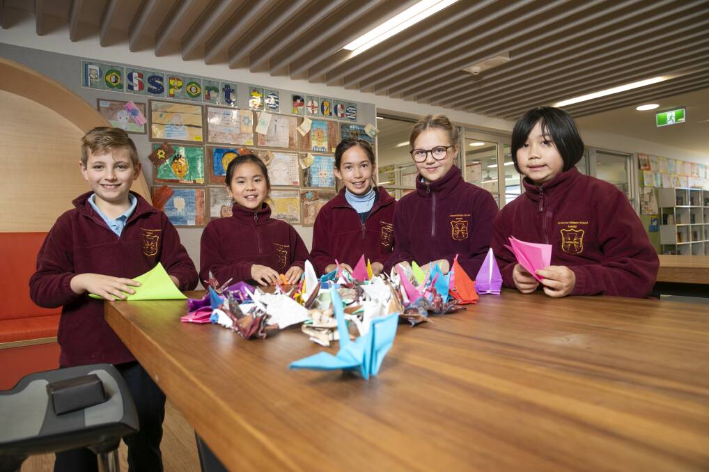St Vincent Primary School students are folding origami cranes to commemorate the Hiroshima and Nagasaki bombings. Picture: Keegan Carroll