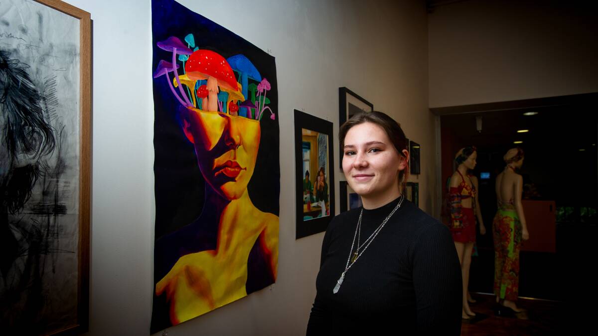 Year 11 Canberra college student, Dana Hoffman, with her artwork titled Brain Rot at the Step into the Limelight art exhibition launch at M16 Artspace.
Picture: Elesa Kurtz