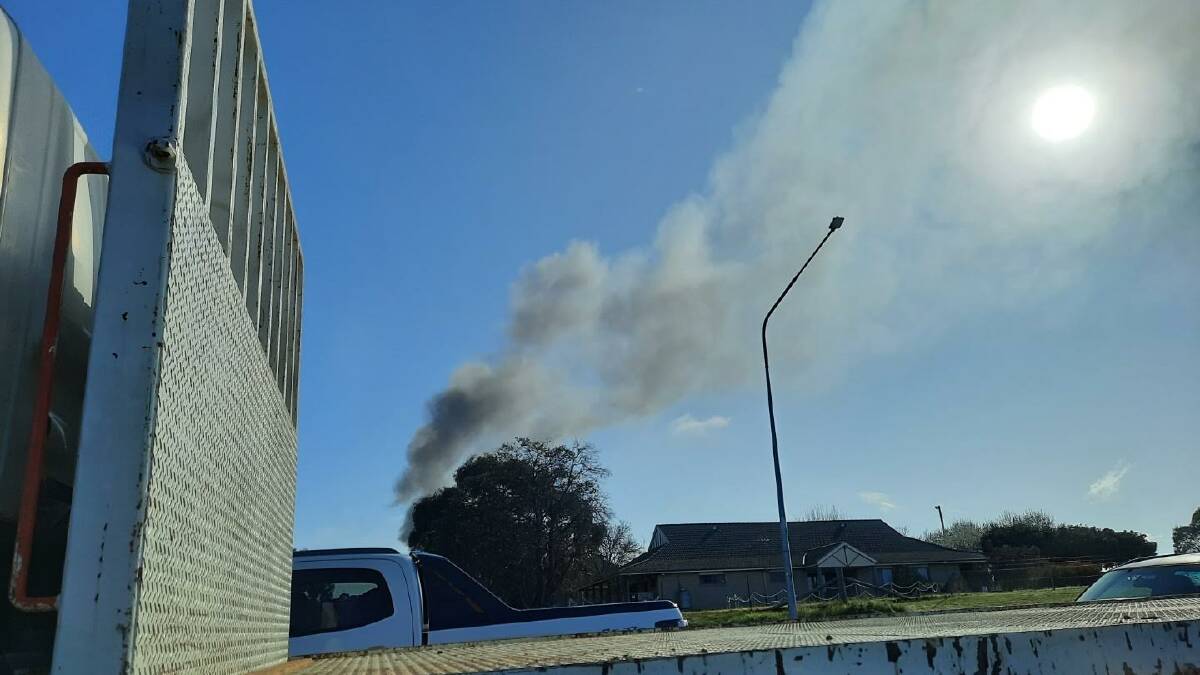 Smoke rising over traffic in Gungahlin. Picture Supplied