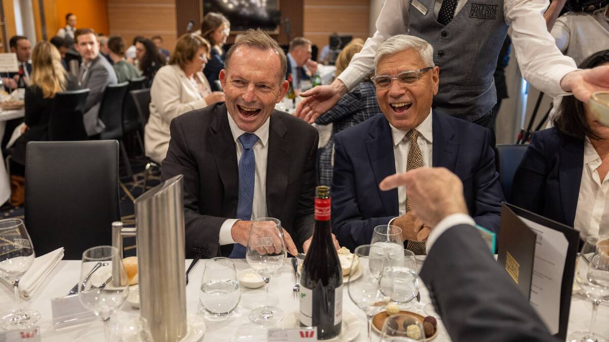 Former prime minister Tony Abbott with Warren Mundine, before his address at the National Press Club in Canberra. Picture by Gary Ramage
