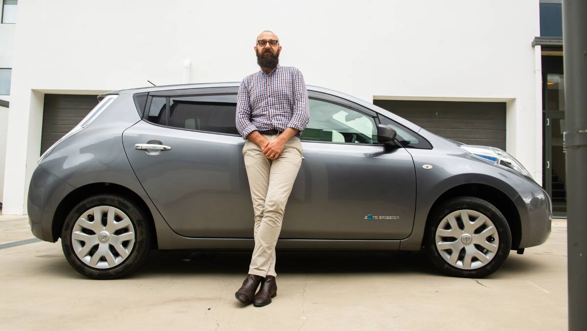 Jonathon Papadopoulo said having an electric vehicle has been a 'huge relief' financially in recent weeks. Picture: Elesa Kurtz