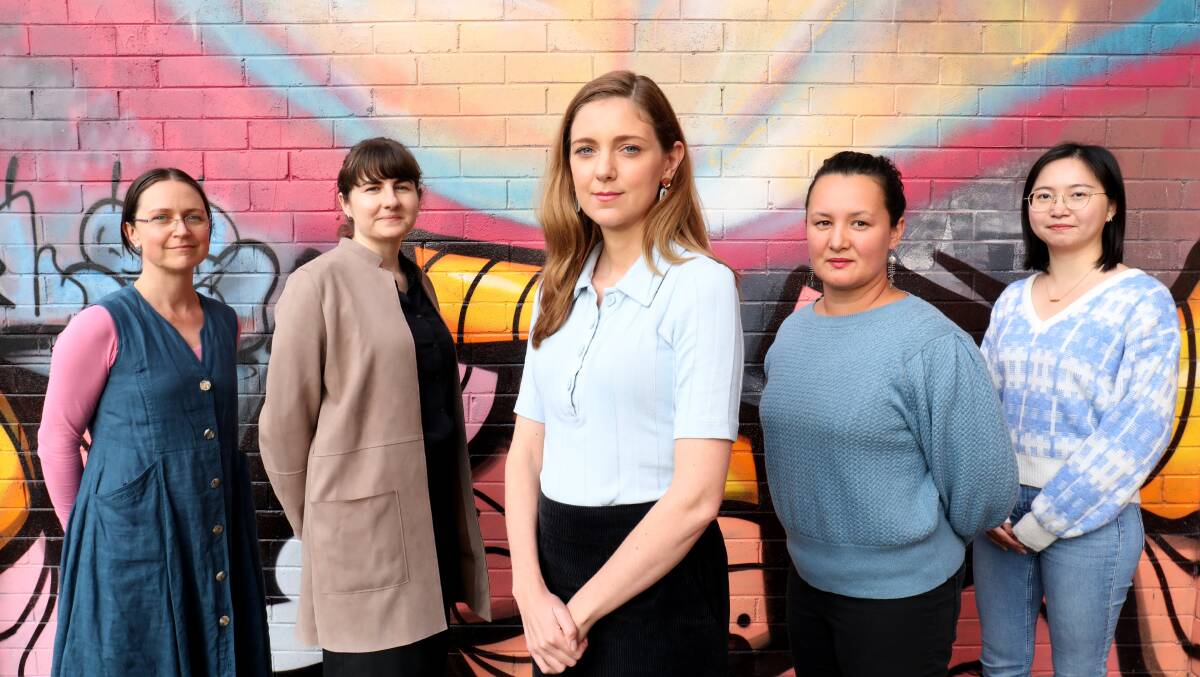 Left to right; Emma Sherwood, Ella Kelly, Bethany Hender, Kasumi Ejiri and Kate Chen from the Women's Legal Centre ACT. Picture: James Croucher