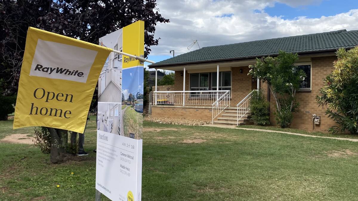 15 Degraves Crescent, Wanniassa kicked off the pair of auctions on Thursday. Picture: Brittney Levinson