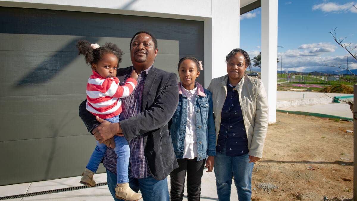 Sebastian Hlatshwayo and Precious Shamba with daughters Kayla, 10, and Zoë, 2, will be the first residents to move into Whitlam this weekend. Picture: Elesa Kurtz