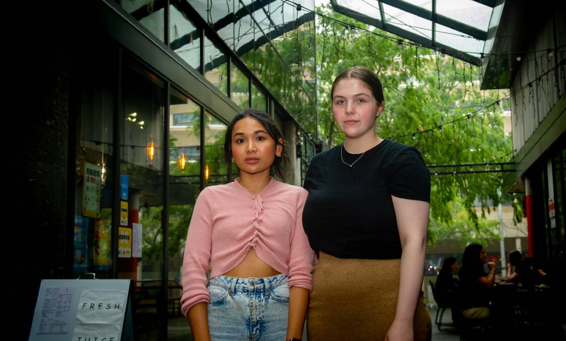 Hospitality workers Hatairat Chanakham, 28, and Elise Crerar, 22, have both faced challenges finding an affordable rental property in the ACT. Picture: Elesa Kurtz
