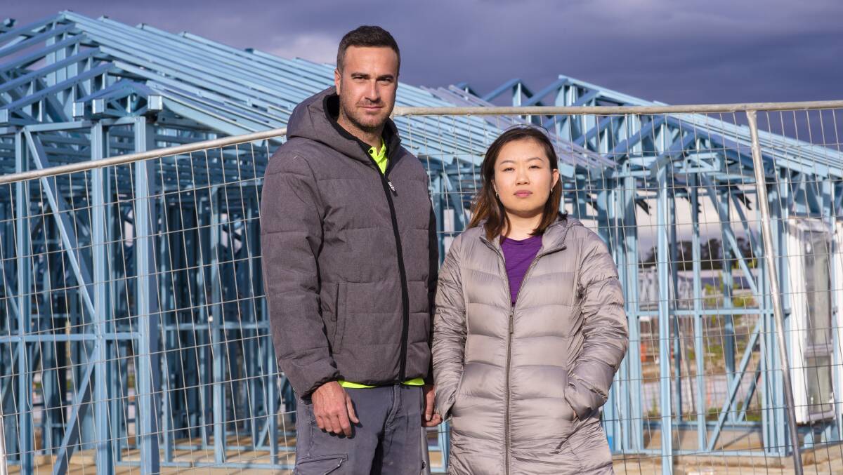 Forever Build Love project manager Jordan Lando and director Serene Teoh standing outside one of their construction sites in Strathnairn. Picture by Keegan Carroll