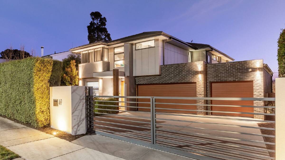 A five-bedroom home in Weston broke the suburb record when it sold at auction. Picture supplied