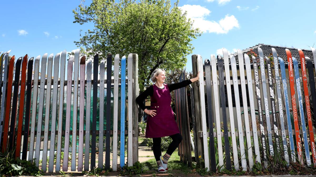Standing proudly in front of her vintage ski fence, Eleanor Morison is preparing to sell her Narrabundah home after 31 years. Picture by James Croucher