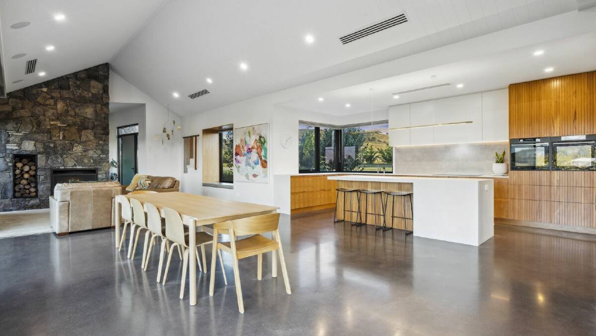 An open-plan living and dining space sits at the centre of the home. Picture supplied