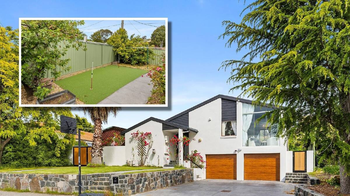 A Calwell home with its own putting green in the backyard has hit the market. Picture supplied