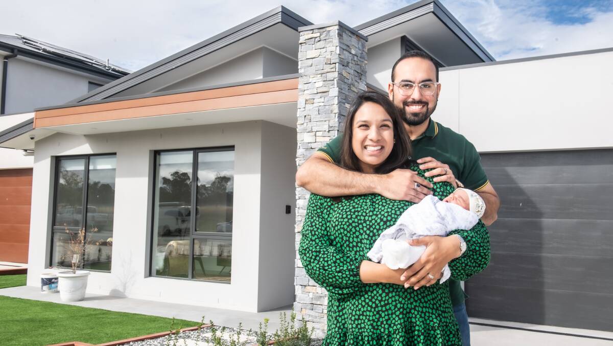 Mariam Hafiz and Mustafa Anwar with their week-old daughter Emaan are among the growing population of Throsby, ACT. Picture: Karleen Minney