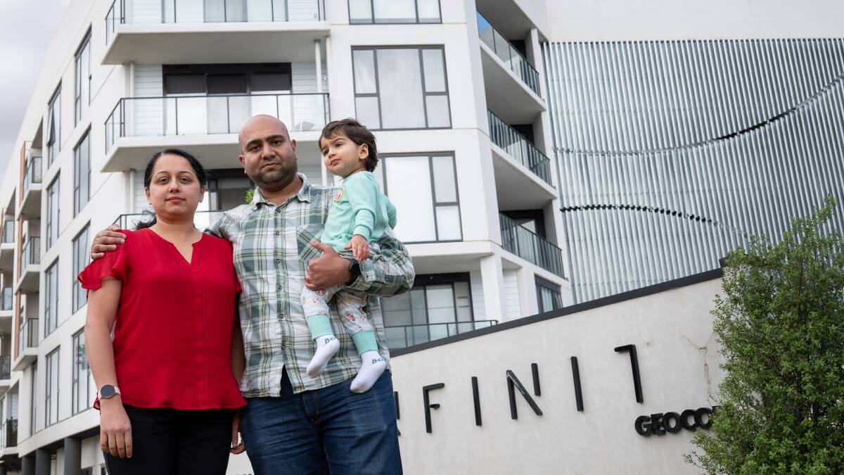 Vikas Nayak, pictured with his wife Amrutha Devidas Shanbhag and 18-month-old son Aryan Nayak, outside the Infinity apartment complex in Gungahlin. Picture by Elesa Kurtz