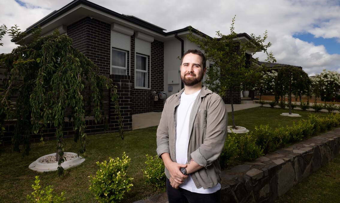 Despite the uncertainty of the year ahead, Hayden Merrell said he's motivated to purchase a home in 2022. Picture: Sitthixay Ditthavong