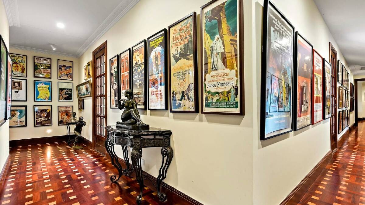The property was built around a vast collection of film posters. Picture LJ Hooker Dickson