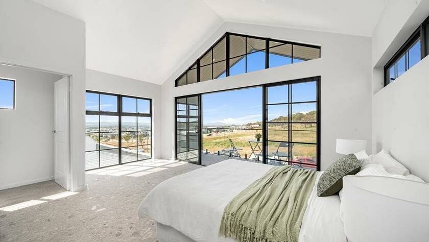 The upper level can be used as a fifth bedroom and boasts views over the reserve. Picture supplied