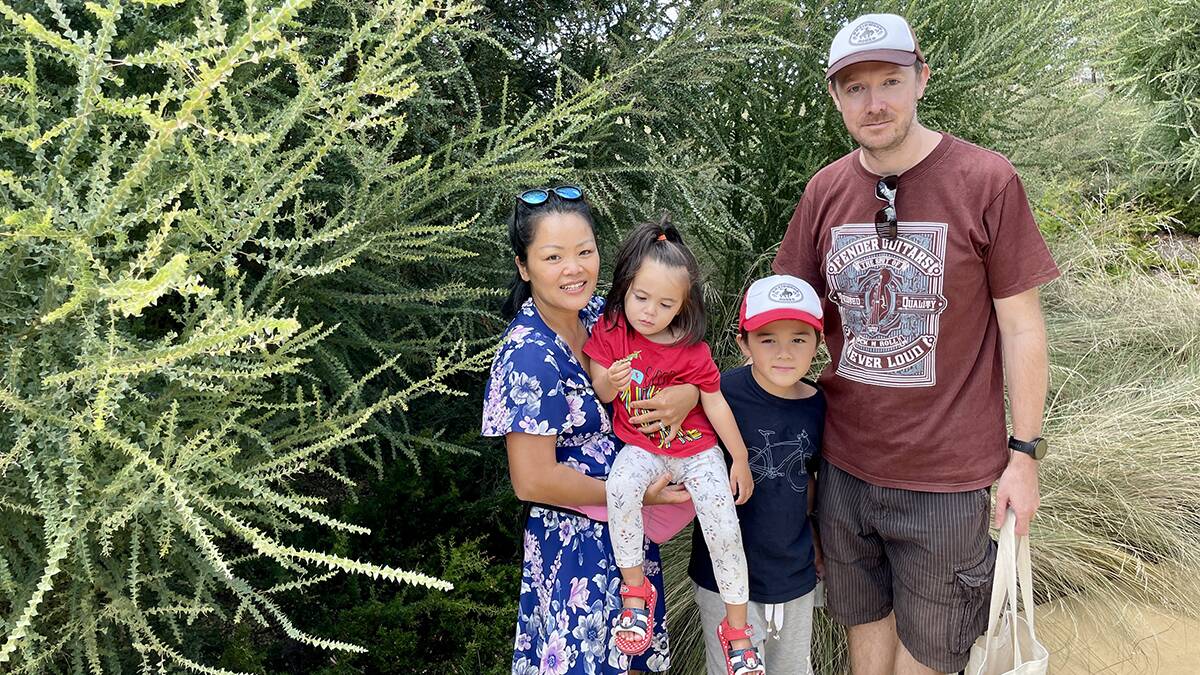 Aritsara and Andrew Corey, pictured with their two young children, were among the first buyers to secure a block of land in Macnamara. Picture: Supplied