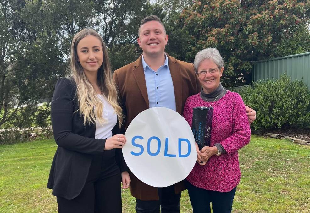 Melissa von der Burg and Michael Martin of Luton Tuggeranong with Lynn West, who sold her Duffy home this spring. Picture supplied