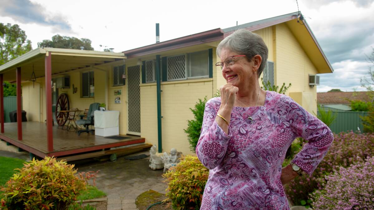 Lynn West outside her Duffy house that sold at auction in September. Picture by Elesa Kurtz
