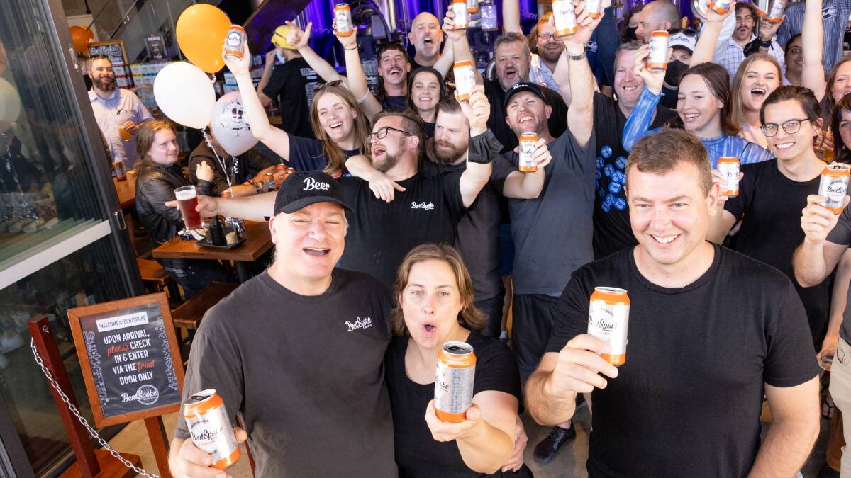 BentSpoke co-founders Richard Watkins and Tracy Margrain celebrate with their team after taking out the number one spot in the nation's biggest craft beer poll. Picture: Sitthixay Ditthavong