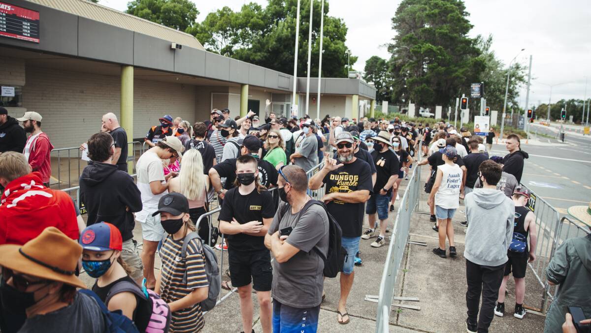 The first people line up as the gates to Summernats are about to open. Picture: Dion Georgopoulos 