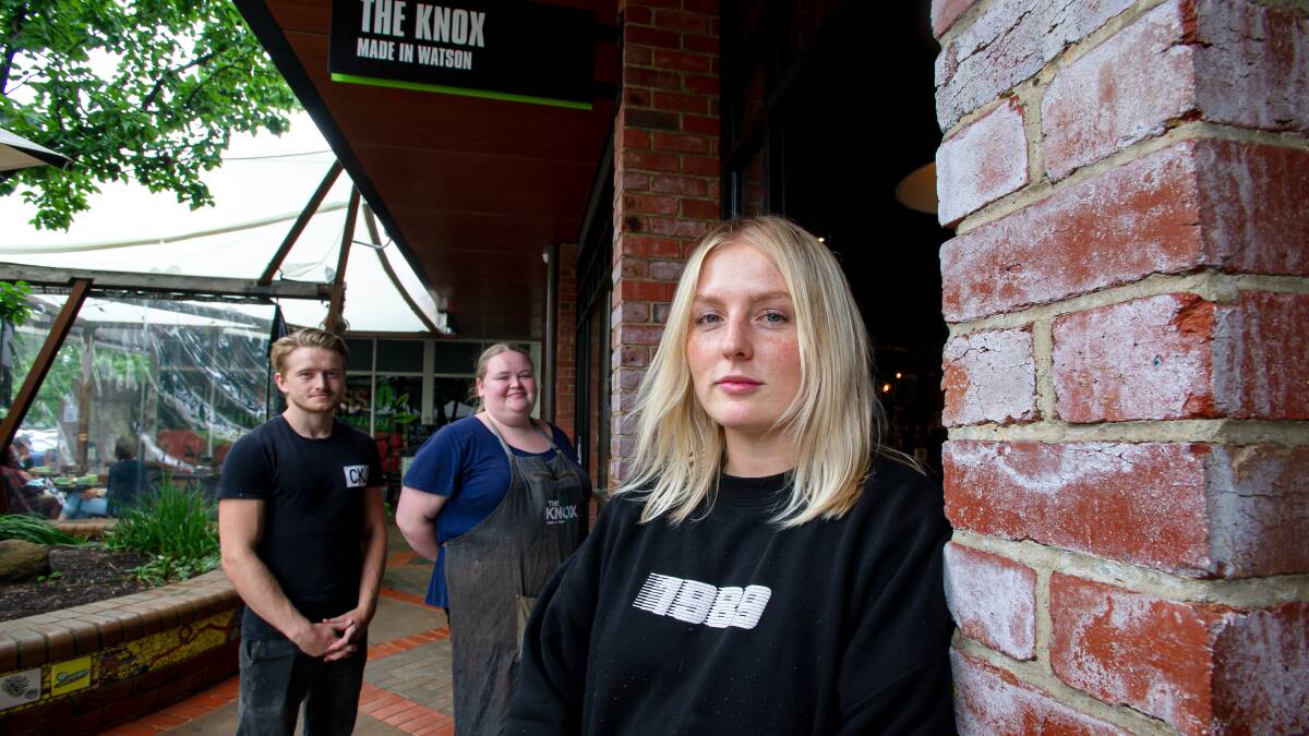 Maddy Kreyl from Knox Cafe, pictured with staff members Oscar Smart and Rebecca Brown. Picture: Elesa Kurtz (above)
