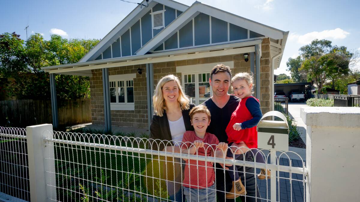 Rob and Joanna Nikolic, pictured with their children Noah, 5, and Emilia, 3, bought a bungalow three years ago which they completely stripped down and rebuilt a back glass section while maintaining the building's heritage. Picture: Elesa Kurtz 