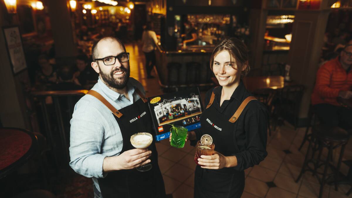 Manager Adrian Moran and bartender Grace Dudley at The Durham Castle in Kingston with some of the features of Seinfeld trivia. Picture: Dion Georgopoulos