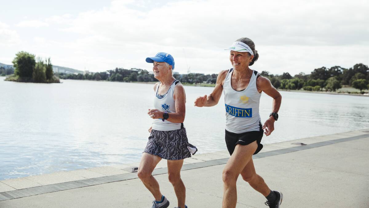 Pam Muston and Ruth Baussmann are set to be the first women to complete their 20th Canberra marathons. Picture: Dion Georgopoulos