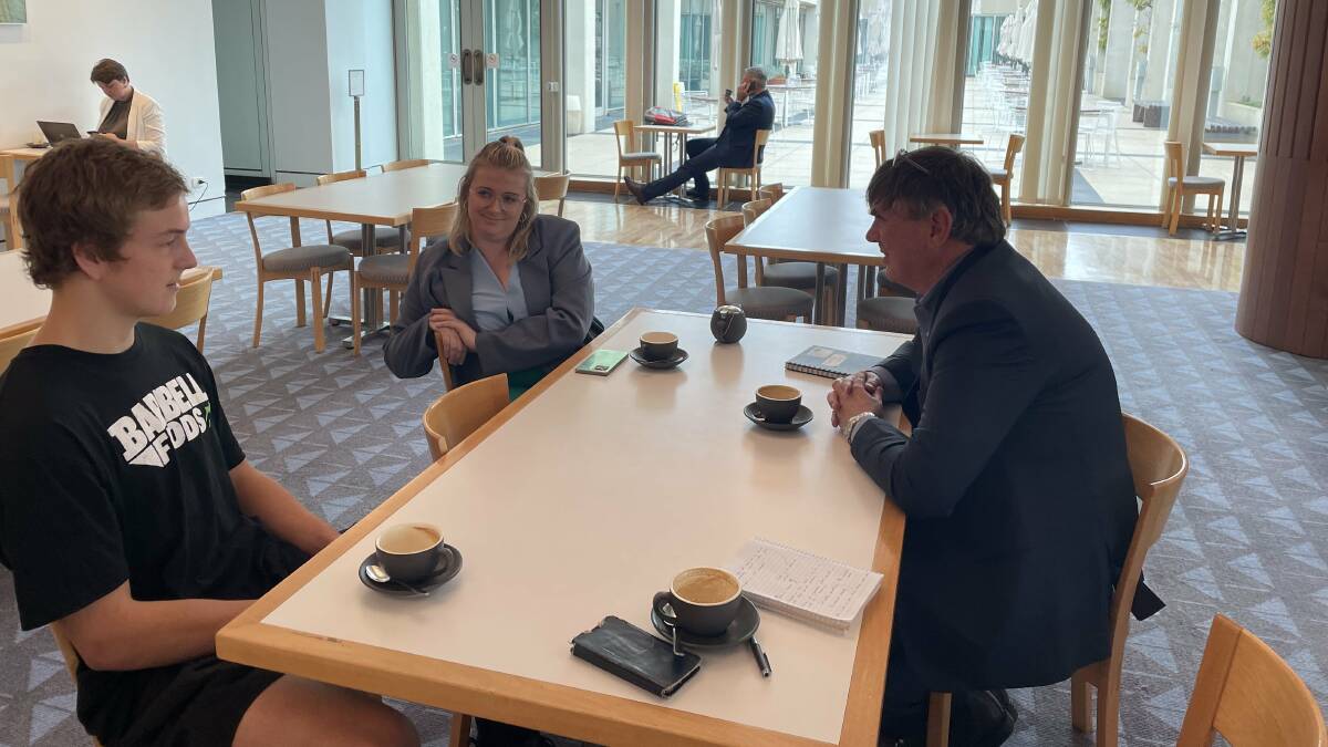 Pub Test participants Ash Laing, Bri Williams and Jeff Bollard discuss politics over a coffee at Parliament House. Picture: Olivia Ireland
